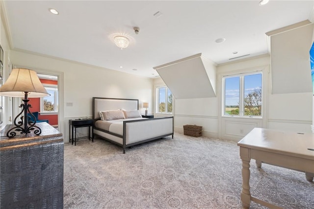 carpeted bedroom with recessed lighting and ornamental molding