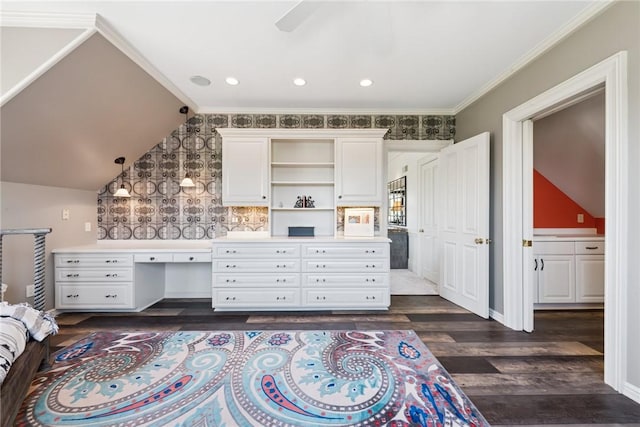 bedroom featuring dark wood-type flooring, vaulted ceiling, crown molding, and recessed lighting