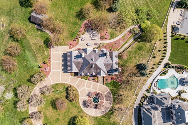 aerial view of property's location with a pool