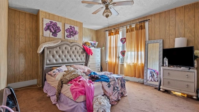 554 Forest Ave, Bellevue, PA 15202 - bedroom with carpet floors, wooden walls, a textured ceiling, and a ceiling fan
