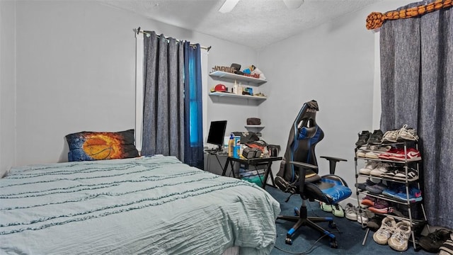 554 Forest Ave, Bellevue, PA 15202 - carpeted bedroom featuring a textured ceiling and a ceiling fan