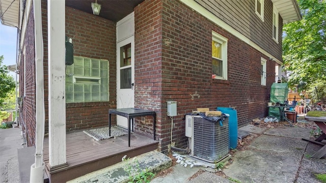 554 Forest Ave, Bellevue, PA 15202 - view of home's exterior featuring brick siding and central AC unit