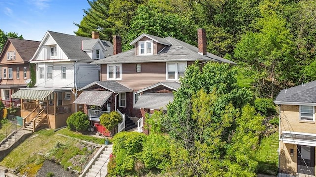 554 Forest Ave, Bellevue, PA 15202 - traditional style home with stairs, a chimney, and a residential view