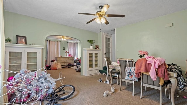 554 Forest Ave, Bellevue, PA 15202 - bedroom featuring carpet flooring, arched walkways, a textured ceiling, ceiling fan, and french doors