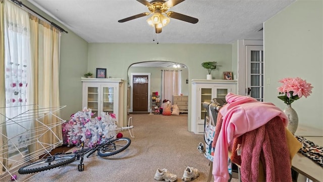 554 Forest Ave, Bellevue, PA 15202 - carpeted living area featuring arched walkways and ceiling fan