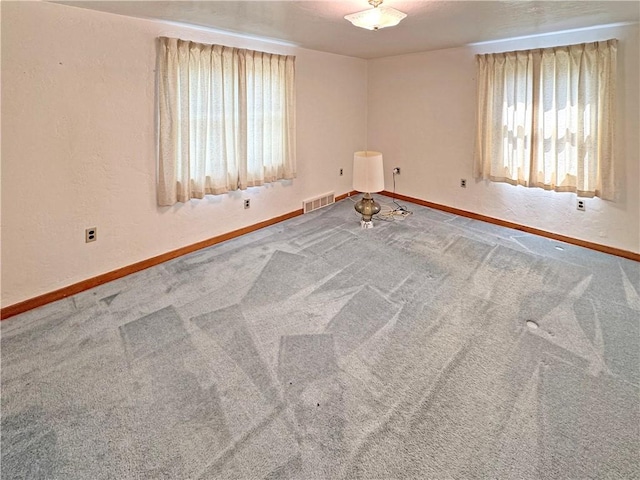 456 Antenor Ave, Overbrook, PA 15210 - carpeted empty room featuring healthy amount of natural light and baseboards