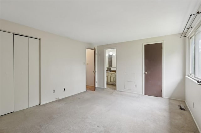207 Parkwood Dr, Cranberry Twp, PA 16066 - unfurnished bedroom with light carpet, connected bathroom, and baseboards
