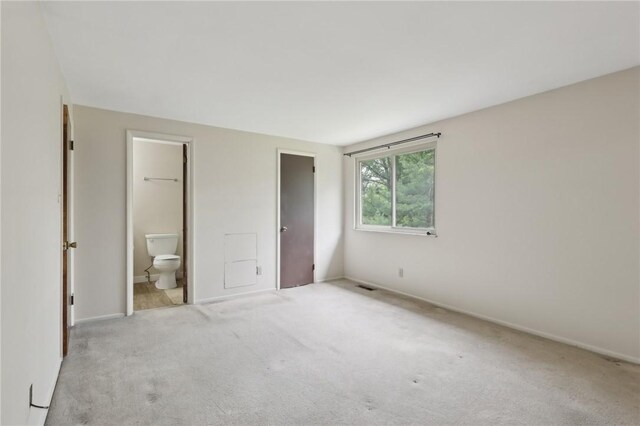 207 Parkwood Dr, Cranberry Twp, PA 16066 - unfurnished bedroom featuring carpet floors, ensuite bathroom, and baseboards