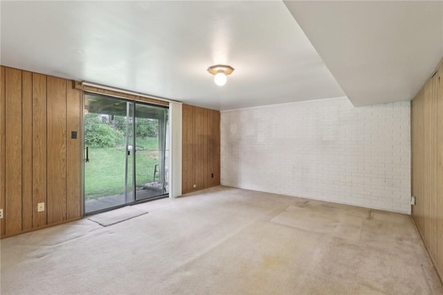 207 Parkwood Dr, Cranberry Twp, PA 16066 - carpeted spare room featuring wooden walls and brick wall