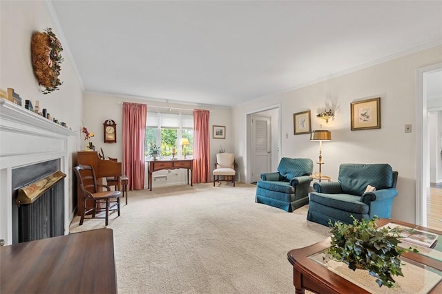 living area with ornamental molding, carpet, and a fireplace