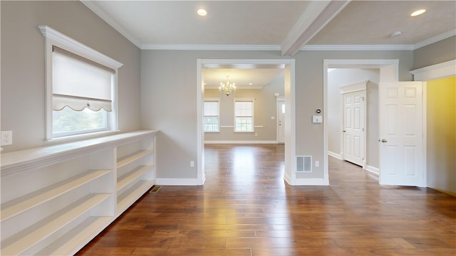 hall featuring dark wood-style floors, a chandelier, ornamental molding, baseboards, and recessed lighting