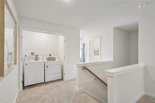 122 River Ridge Drive, Moon/Crescent Twp, PA 15108 - washroom featuring washing machine and dryer, baseboards, and light carpet