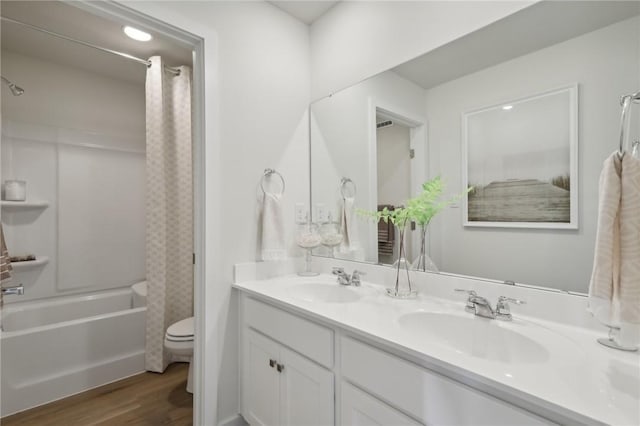 122 River Ridge Drive, Moon/Crescent Twp, PA 15108 - full bathroom with toilet, wood finished floors, shower / bathtub combination with curtain, and double vanity
