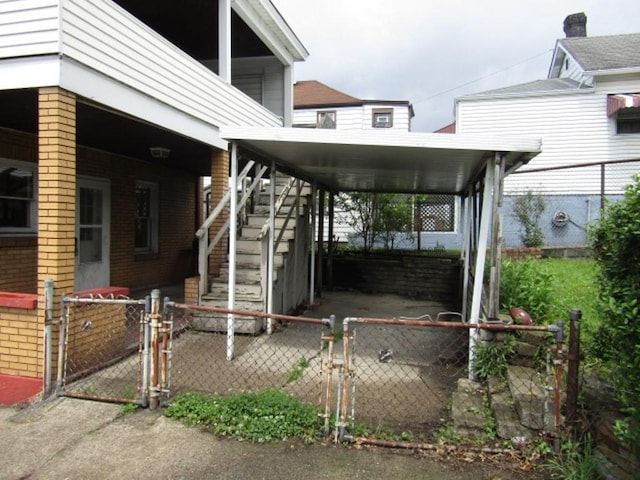 643 Indiana Ave, Glassport, PA 15045 - view of property exterior featuring brick siding, a gate, and stairway