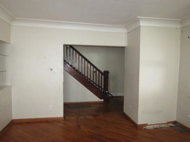 643 Indiana Ave, Glassport, PA 15045 - interior space with wood finished floors, baseboards, and stairs