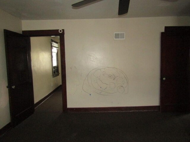 643 Indiana Ave, Glassport, PA 15045 - empty room with ceiling fan and baseboards