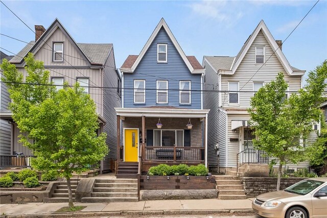 multi unit property featuring covered porch