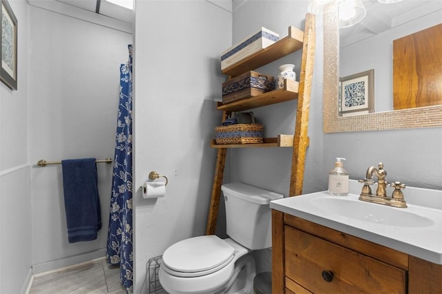 full bath featuring toilet, vanity, and curtained shower