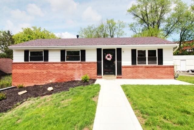 513 Crestview Dr, Plum Boro, PA 15239 - ranch-style home featuring brick siding and a front lawn
