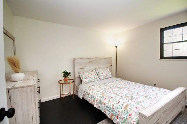 513 Crestview Dr, Plum Boro, PA 15239 - bedroom with dark wood-type flooring and baseboards