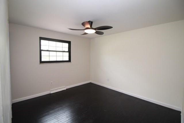 513 Crestview Dr, Plum Boro, PA 15239 - unfurnished room featuring ceiling fan, dark wood-style floors, and baseboards