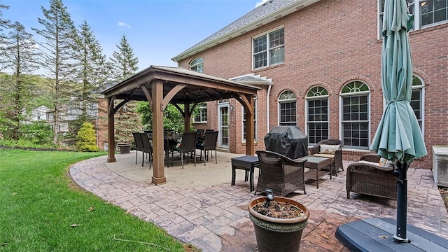 view of patio / terrace with a gazebo, a grill, and outdoor lounge area