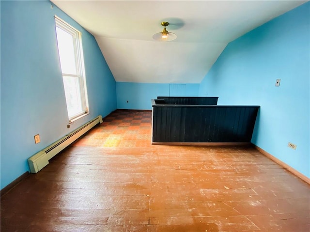 811 Farragut St, Highland Park, PA 15206 - additional living space featuring a baseboard heating unit, vaulted ceiling, hardwood / wood-style flooring, and baseboards