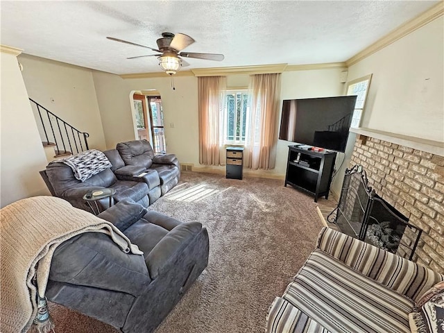 5422 Library Rd, Bethel Park, PA 15102 - living area with a textured ceiling, arched walkways, stairway, ceiling fan, and carpet floors