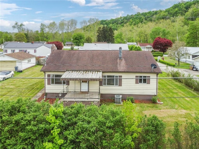 28 Main St, Clarksville, PA 15322 - back of house with central air condition unit and a shingled roof