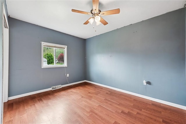 28 Main St, Clarksville, PA 15322 - spare room with wood finished floors, baseboards, and ceiling fan