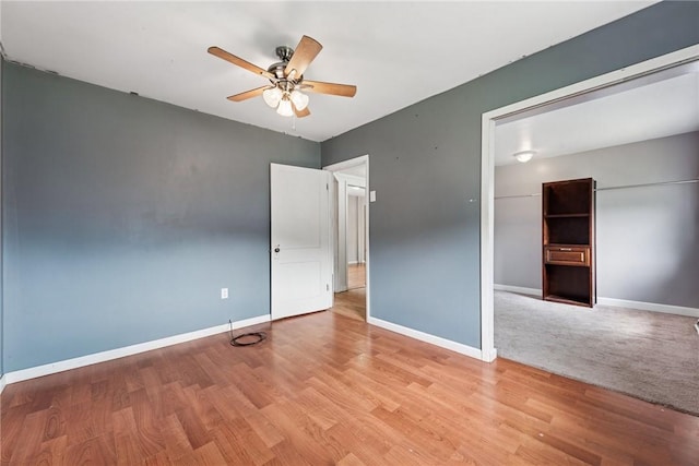 28 Main St, Clarksville, PA 15322 - unfurnished bedroom featuring wood finished floors, baseboards, and ceiling fan
