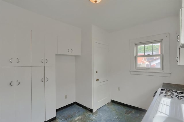6810 Grand Ave, Neville Twp, PA 15225 - kitchen featuring white cabinets and baseboards