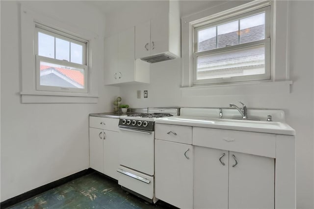 6810 Grand Ave, Neville Twp, PA 15225 - kitchen featuring white gas range oven, plenty of natural light, white cabinets, and light countertops