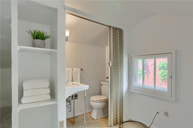 6810 Grand Ave, Neville Twp, PA 15225 - bathroom featuring toilet and vaulted ceiling