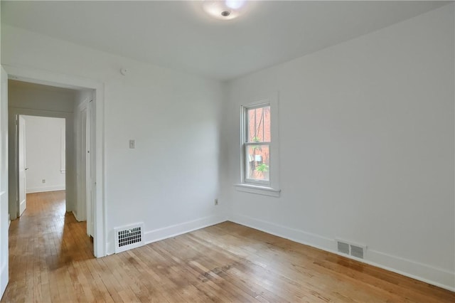 6810 Grand Ave, Neville Twp, PA 15225 - empty room featuring light wood finished floors and baseboards