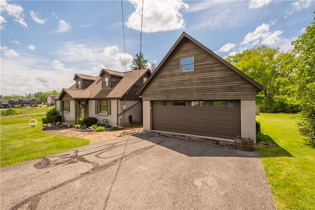 230 Brookwood Rd, Peters Twp, PA 15367 - view of front of home with driveway, a front yard, stucco siding, and an attached garage