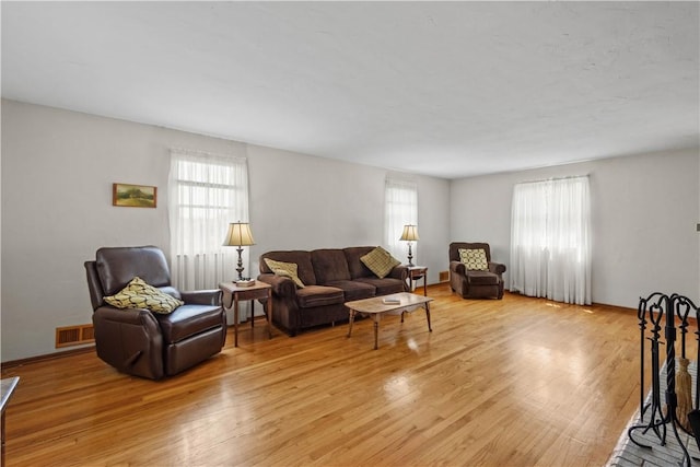 230 Brookwood Rd, Peters Twp, PA 15367 - living room featuring light wood-type flooring and baseboards