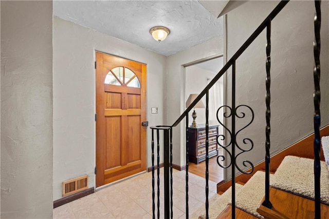 230 Brookwood Rd, Peters Twp, PA 15367 - foyer with stairs and a textured wall