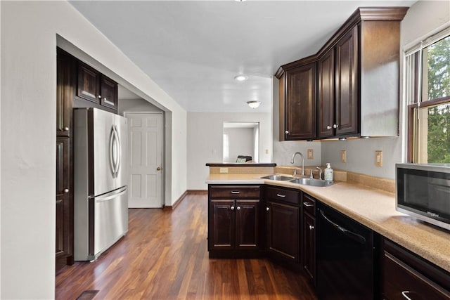 230 Brookwood Rd, Peters Twp, PA 15367 - kitchen with stainless steel appliances, a sink, light countertops, dark wood-style flooring, and recessed lighting