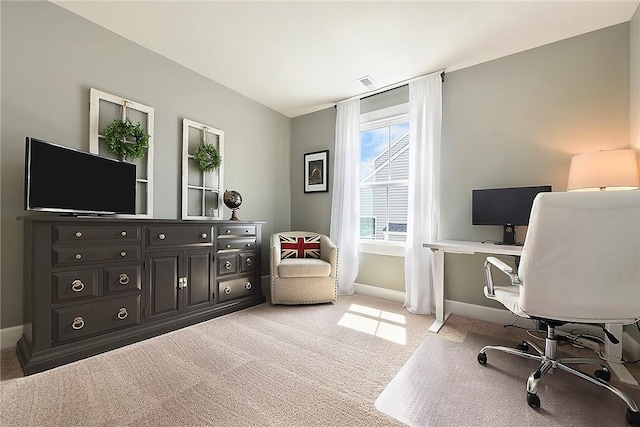 office space featuring light colored carpet and baseboards