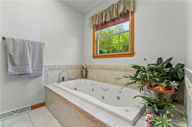 full bath with tile patterned flooring, a tub with jets, crown molding, and baseboards