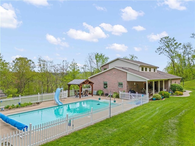 view of swimming pool featuring a water slide, a gazebo, and a patio area
