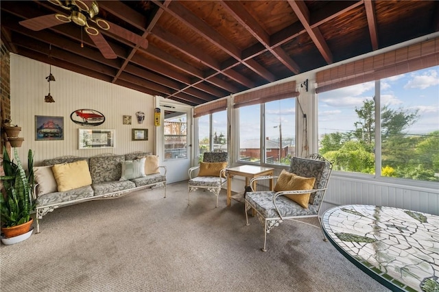 sunroom / solarium featuring ceiling fan