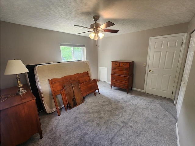 7 Hiland Valley Dr Unit 705, Ross Twp, PA 15229 - bedroom with a textured ceiling, carpet, and ceiling fan