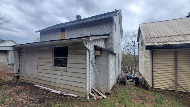 view of outbuilding featuring cooling unit