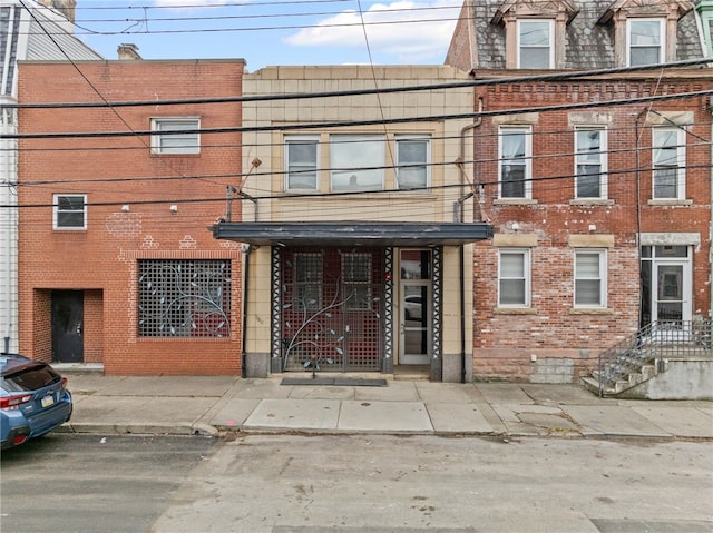 view of front of property with brick siding