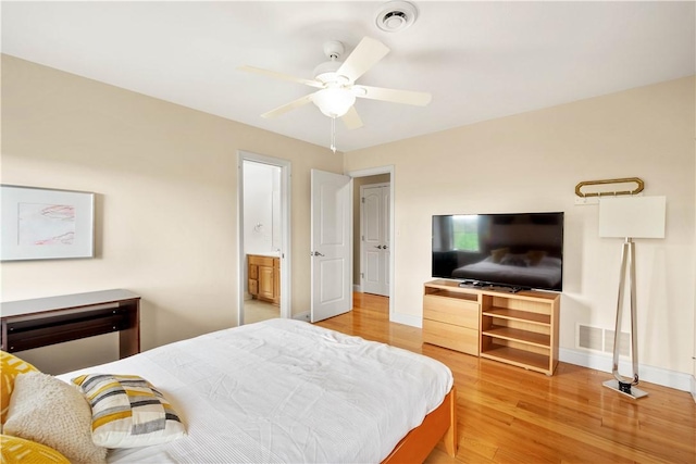 bedroom featuring light wood-style flooring, baseboards, and ceiling fan