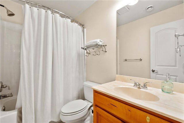 full bathroom with toilet, vanity, and shower / tub combo with curtain