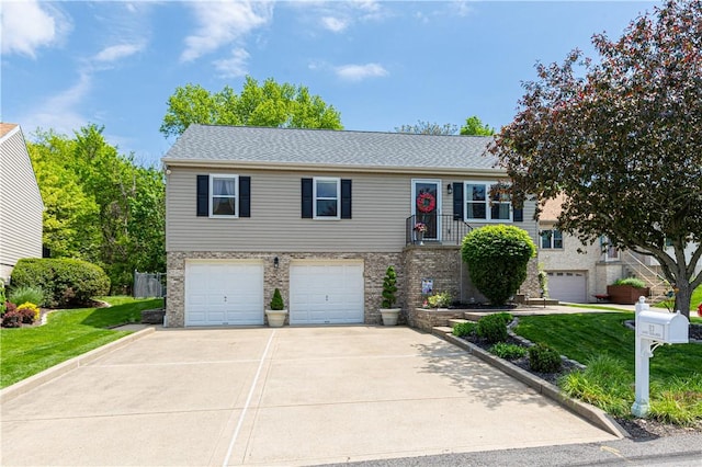 113 Seavey Highlands, Shaler, PA 15223 - view of front facade featuring a front lawn, a garage, concrete driveway, and brick siding