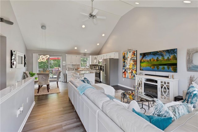 113 Seavey Highlands, Shaler, PA 15223 - living area featuring a ceiling fan, recessed lighting, wood finished floors, high vaulted ceiling, and baseboards